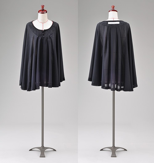 Blusa tipo capa